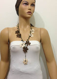 10.20.25 BEIGE and BROWN OYA Flower Lariat Necklace with purplish black beads.