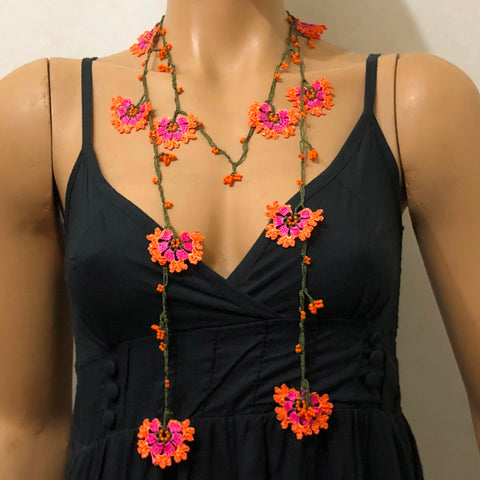 10.12.18 Orange and Fuschia Crochet beaded flower lariat necklace with Orange beads.