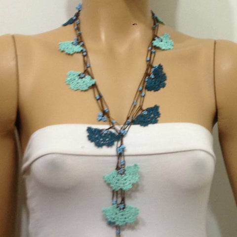 10.13.11 Blue and Teal Green Crochet beaded flower lariat necklace with Blue beads.