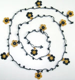 10.14.16 Black and Yellow Daisy Crochet beaded flower lariat necklace with Black Onyx Stones.