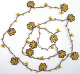 10.19.11 Yellow and Brown Crochet beaded OYA flower lariat necklace with Golden Beads.