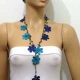 10.20.12 Blue OYA Flower Lariat Necklace with purplish black beads.