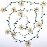 10.20.14 Beige OYA Flower Lariat Necklace with purplish black beads.