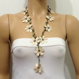 10.20.14 Beige OYA Flower Lariat Necklace with purplish black beads.
