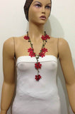 10.20.15 RED OYA Flower Lariat Necklace with purplish black beads.