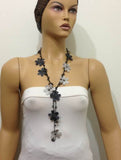 10.20.21 BLACK and Gray OYA Flower Lariat Necklace with purplish black beads.