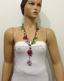10.20.24 LILAC, Burgundy and Green OYA Flower Lariat Necklace with purplish black beads.