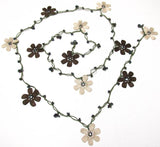 10.20.25 BEIGE and BROWN OYA Flower Lariat Necklace with purplish black beads.