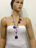 10.20.28 Lilac and Purple OYA Flower Lariat Necklace with purplish beads.